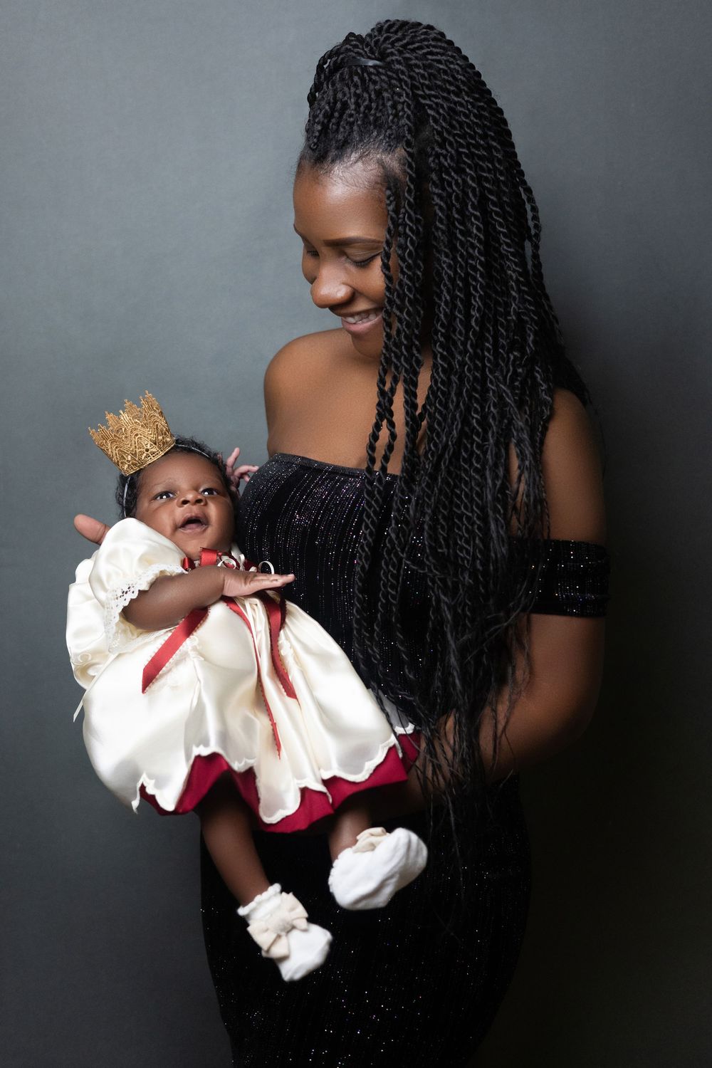 Mother and her baby daughter in a studio portrait after the maternity session